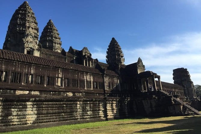 1 Day Angkor Wat with Sunrise Tour - Moving through Angkor Thom South Gate like a story in stone