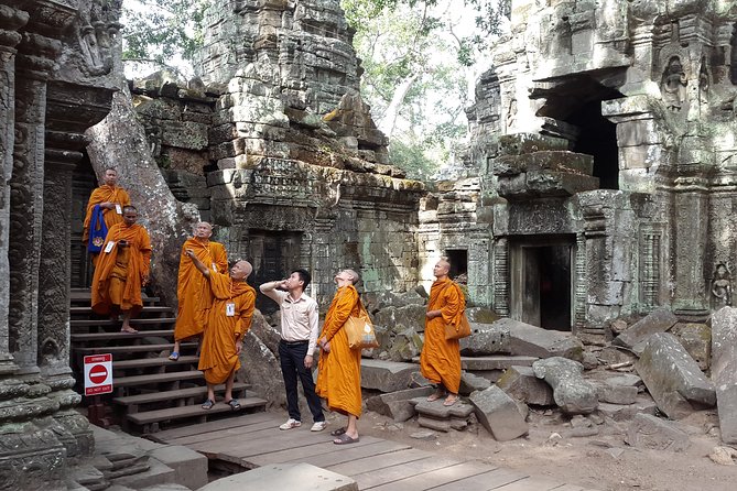1day private tour all main temple in Angkor,sunset at TonleSap floating village - Ta Prohm: tree roots, iconic filming, and practical walking tips
