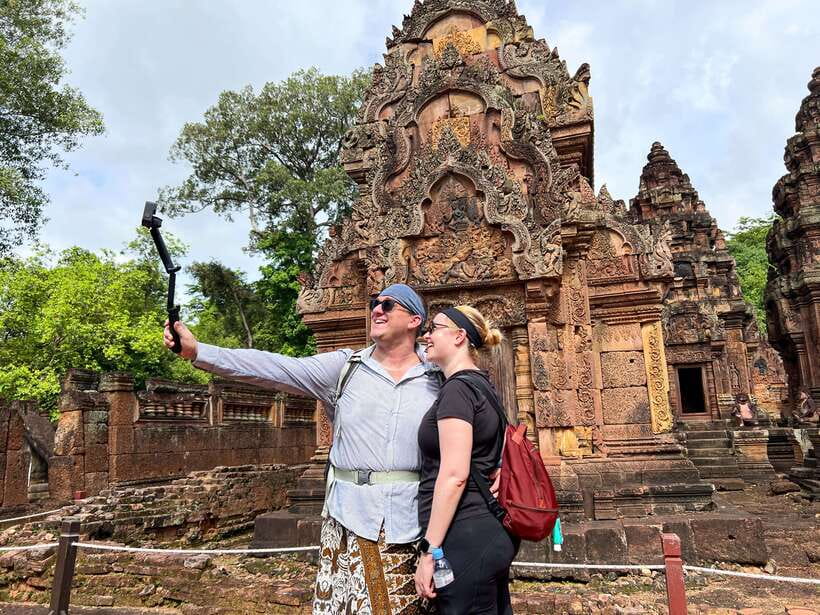 2-Day Angkor Wat, Kulen Mountain, Beng Mealea and Tonle Sap - Angkor Thom + Ta Prohm: smiling faces, elephant terraces, and a temple that looks half-wild