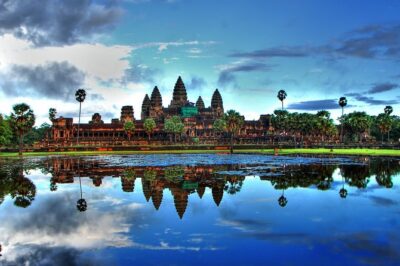 2-Day Angkor Wat & Tonle Sap Tour - Day 1 Through Angkor Thom: Faces, Terraces, and Ta Prohm’s Root Maze