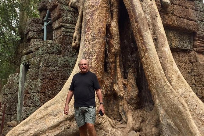 A Day Angkor Wat Sunrise Tour, Ta Prohm & Hidden Gems Beng Mealea - Bayon Temple: Smiling Faces, Slower Looking Time