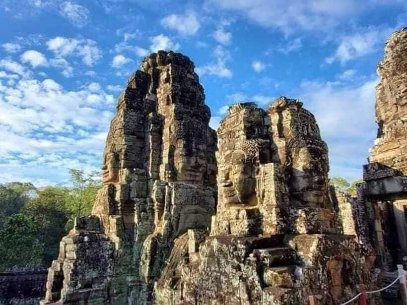 Angkor Cycling Tour - Angkor Thom fortifications: Ghost Gate and the thrill of wall riding