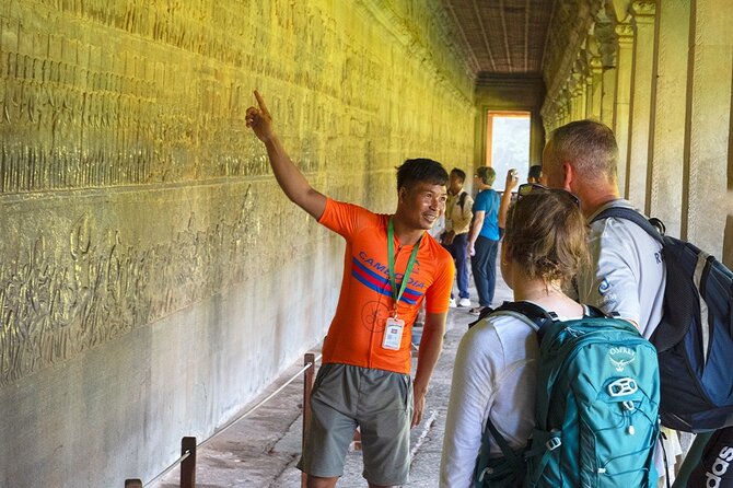 Angkor Sunrise Bike Tour - Breakfast & Lunch included - Angkor Thom and Bayon: south gate carvings to smiling faces