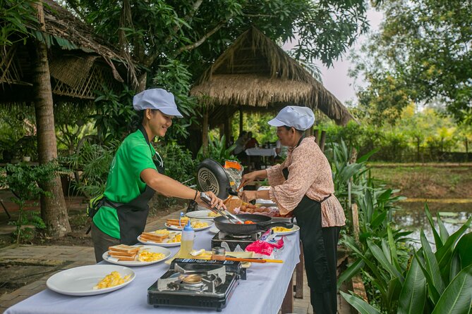 Angkor Sunrise Bike Tour / E-Bike or Tuk Tuk - Angkor Wat at sunrise, powered by wheels