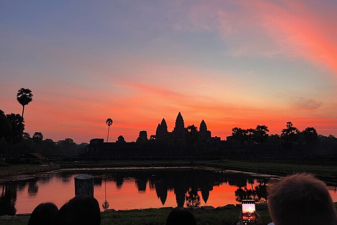 Angkor Sunrise Bike Tour with Lunch Included - Angkor Wat at sunrise: ponds, towers, and timing for photos