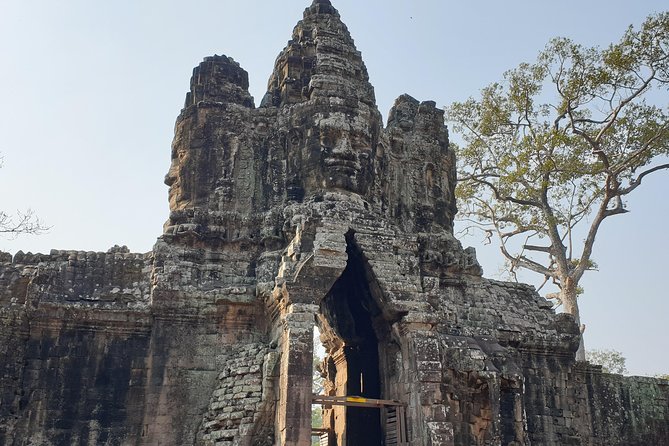 Angkor Wat Full Day Tour in Siem Reap Small-Group - Bayon Temple and the four smiling faces: what to look for