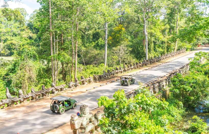 Angkor Wat: Guided Jeep Tour Inclusive lunch at local house - Entering Angkor Thom: the gate with elephants and giant faces