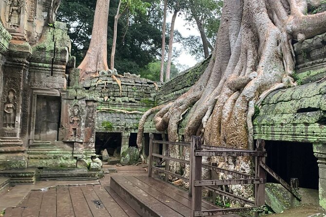 Angkor Wat Sunrise and Tonle Sap Cruise Sunset Tour - Angkor Wat Sunrise: East Gate to West Gate in the Right Light