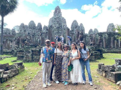 Explore Angkor Temple Sunset With Tour Guided - South Gate of Angkor Thom: Four Faces and the Start of the Story