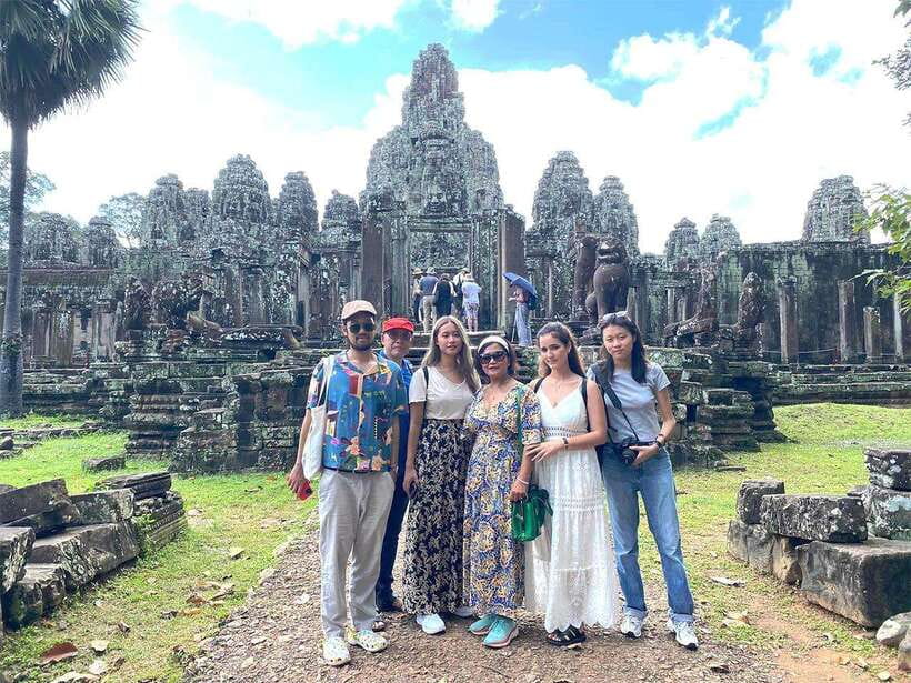 Explore Angkor Temple Sunset With Tour Guided - South Gate of Angkor Thom: Four Faces and the Start of the Story