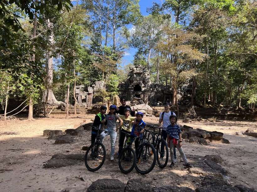 Explore Angkor Wat by Bike and Sunset - Phnom Bakheng sunset: riding up for the classic view