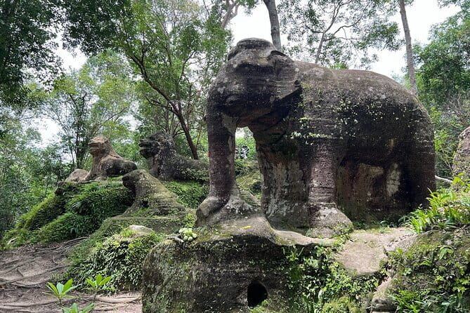 Full-Day Guided Bicycle Tour in Angkor Wat Temple - Angkor Thom walls, Bayon faces, and the terrace detours