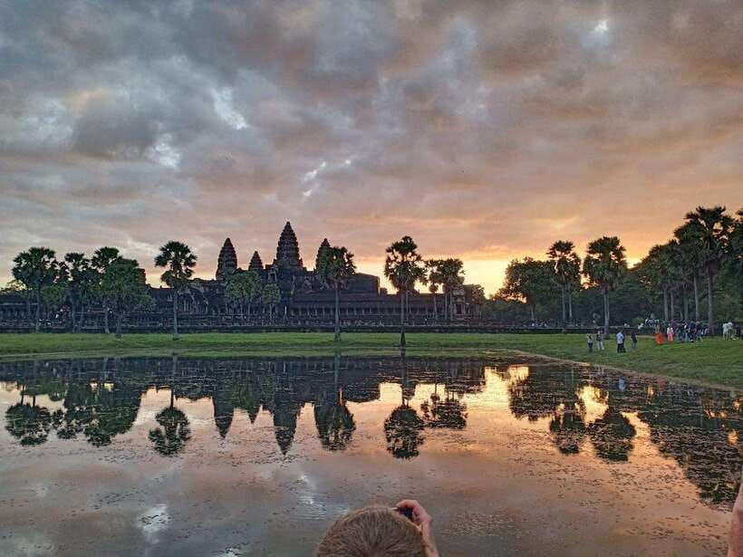 One Day Angkor Wat Trip with Sunrise - Angkor Wat at first light: where the reflection and carvings come in