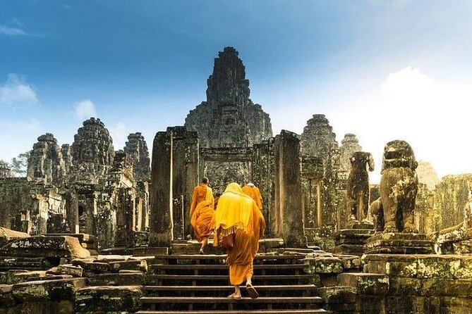 One Full Day Private tour of Angkor Wat, Ta Prohm, Angkor Thom & Banteay Srie - Ta Prohm: jungle grip and movie-famous mood