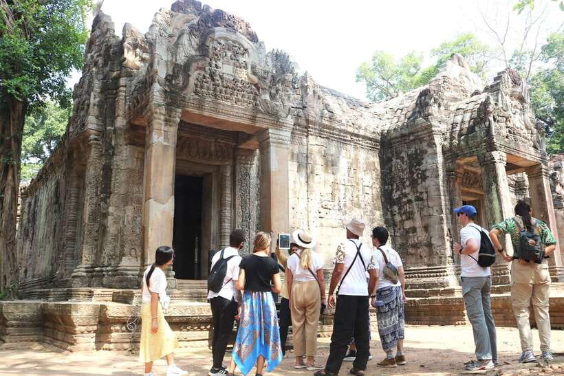 Siem Reap: Angkor Wat: Small-Group Sunrise Tour - Angkor Thom and Bayon: those face towers feel personal