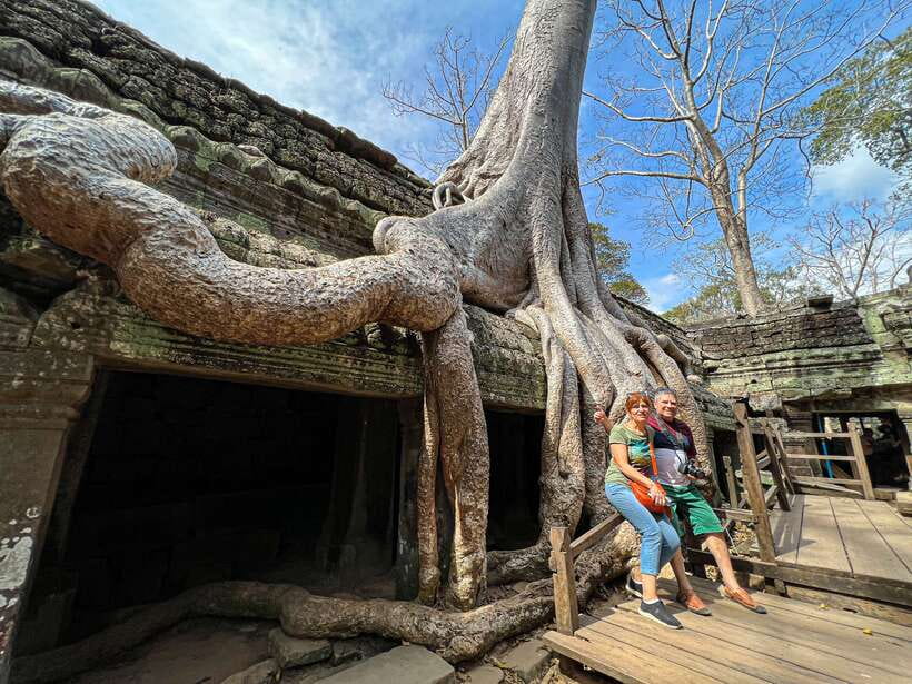 Siem Reap: Angkor Wat Sunrise and Market Tour by Jeep - Bayon Temple and Victory Gate: Stone Faces and City-Wall Energy