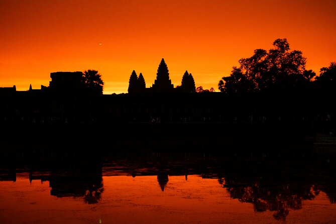 Siem Reap: Angkor Wat Sunrise & Explore Angkor Temples With Guide - Ta Prohm and Angkor Thom: Jungle Drama Meets Royal Capital