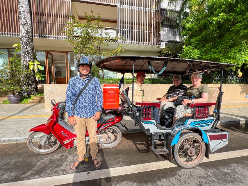 Siem Reap: Angkor Wat Sunrise Tour via Tuk Tuk & Breakfast - Bayon and Victory Gate: Smiling Faces and Jayavarman VII