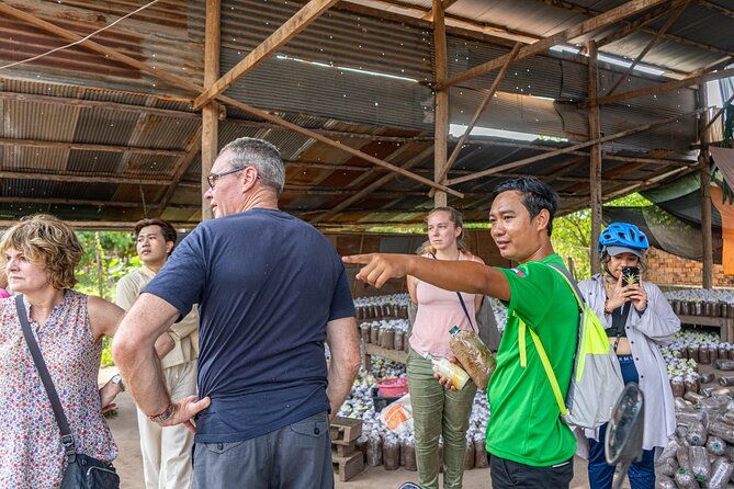 Siem Reap: Countryside Sunset Bike Tour / E-Bike or Tuk Tuk - The traditional village stop: walk, wave, and short conversations