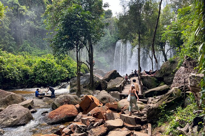 Siem Reap Kulen Mountain Waterfall Tour and Picnic lunch - Waterfall Time: Picnic Lunch, Smooth Rocks, and Cold Pool Fun