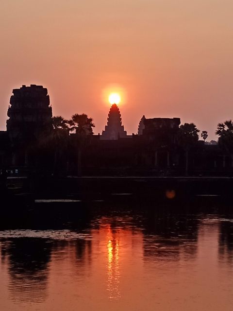 Siem Reap Private Tour: Angkor Wat Sunrise And Banteay Srei - Bayon Temple in Angkor Thom: walking among 200+ faces