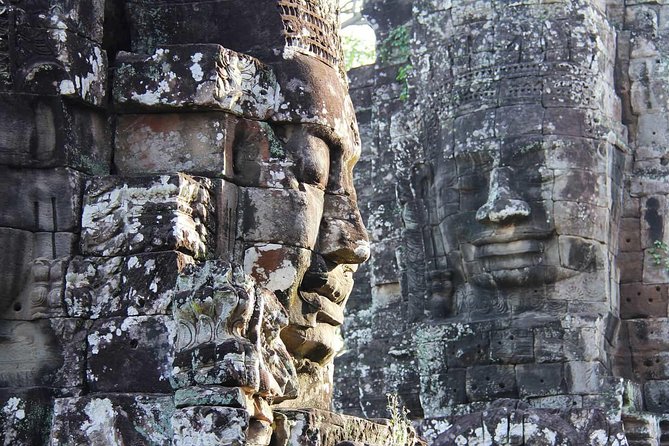 Sunrise Small Group Tour to Angkor Wat Temple - Ta Prohm: the jungle temple with roots in the frame