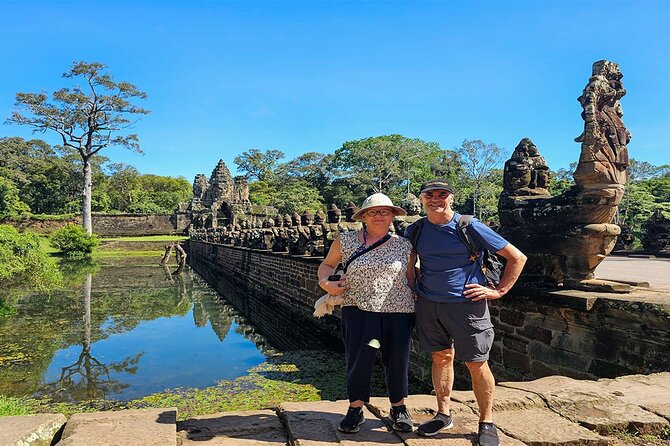 Ultimate Half Day Tour- Angkor Wat, Ta Promh and Bayon Temple - South Gate of Angkor Thom: the giant smiling faces moment